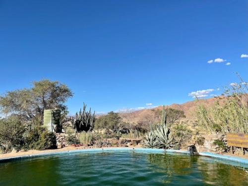 Swimming pool, Camp Gecko - PRIVATE NATURE RESERVE; TENTED CAMP AND CAMPSITE in Solitaire Swimming pool, Camp Gecko - PRIVATE NATURE RESERVE; TENTED CAMP AND CAMPSITE in Solitaire