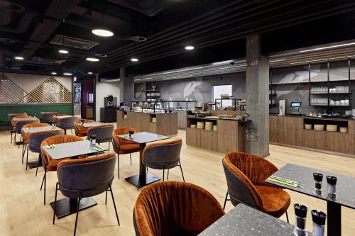 Restaurant, Essential by Dorint Interlaken - New Opening near Tourist Museum Restaurant, Essential by Dorint Interlaken - New Opening near Tourist Museum