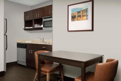 Kitchen, Homewood Suites by Hilton® Dallas Downtown, TX near Perot Museum of Nature and Science Kitchen, Homewood Suites by Hilton® Dallas Downtown, TX near Perot Museum of Nature and Science