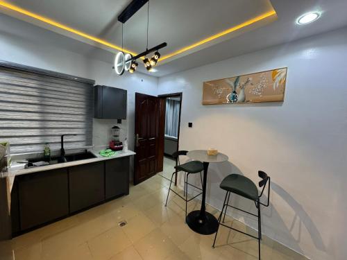 Kitchen, Cozy Ambience 1 in Ibadan Kitchen, Cozy Ambience 1 in Ibadan