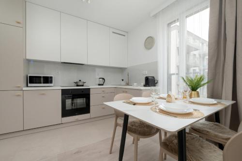 Cozinha, Exceptional Apartment with Parking by Noclegi Renters in Welnowiec Cozinha, Exceptional Apartment with Parking by Noclegi Renters in Welnowiec