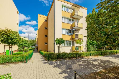 Family Apartment with Balcony by Noclegi Renters