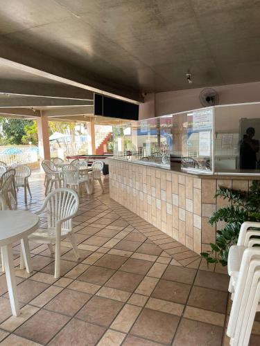 Bar/lounge, Flat Thermas Dos Buritis in Popular Bar/lounge, Flat Thermas Dos Buritis in Popular
