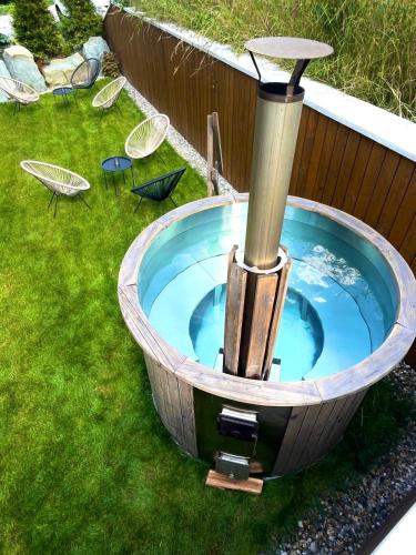 Baño al aire libre, Apartmány Na Satině (Apartmany Na Satine) in Frydlant Nad Ostravici Baño al aire libre, Apartmány Na Satině (Apartmany Na Satine) in Frydlant Nad Ostravici