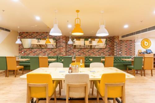 Restaurant, Bloom Hotel - CR Park in New Delhi and NCR Restaurant, Bloom Hotel - CR Park in New Delhi and NCR