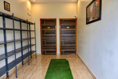 ห้องส่วนกลางสำหรับนั่งเล่น/ดูทีวี, Beedu Hostel in โคกุลัม ห้องส่วนกลางสำหรับนั่งเล่น/ดูทีวี, Beedu Hostel in โคกุลัม