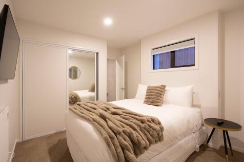 Stylish 2-BR Home, Scenic Balcony, Key Amenities