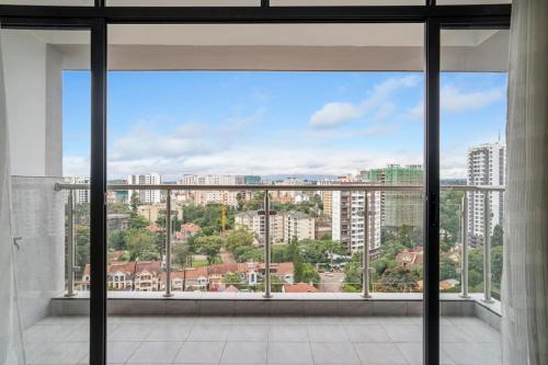 1BR Apartment with Gym, King Bed ,City Views and Prime Location