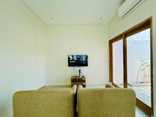 Maison avec 2 chambre(s) de 100 m² et 1 salle(s) de bains privée(s) à Praya (Tio Homestay) in Praya Maison avec 2 chambre(s) de 100 m² et 1 salle(s) de bains privée(s) à Praya (Tio Homestay) in Praya