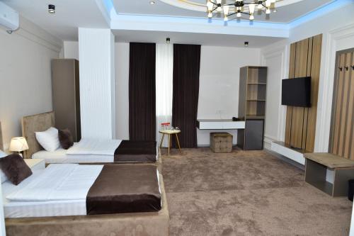 MehmonsaroyGrand in ฟาร์โกนา MehmonsaroyGrand in ฟาร์โกนา