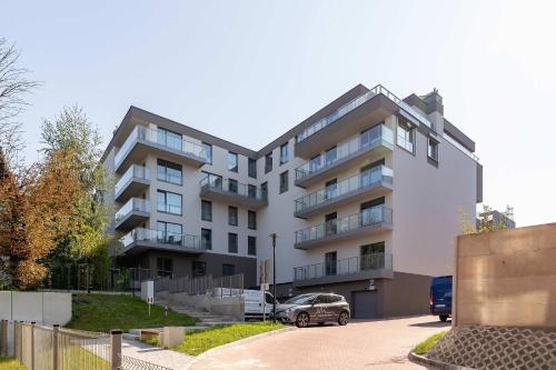 Vista Exterior, Słoneczna Comfy Apartment with Balcony & Parking Katowice by Noclegi Renters (Sloneczna Comfy Apartment with Balcony & Parking Katowice by Noclegi Renters) in Welnowiec Vista Exterior, Słoneczna Comfy Apartment with Balcony & Parking Katowice by Noclegi Renters (Sloneczna Comfy Apartment with Balcony & Parking Katowice by Noclegi Renters) in Welnowiec
