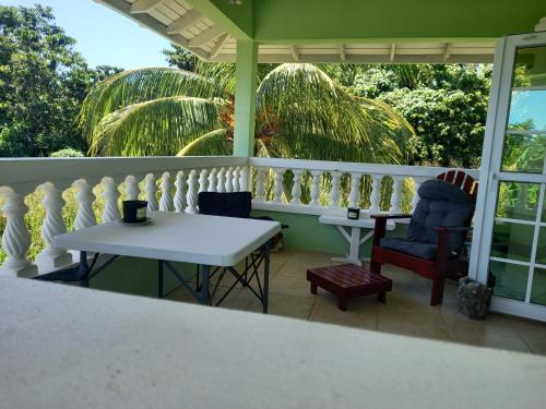 Balcony/terrace, Villa Ora in Calibishie Balcony/terrace, Villa Ora in Calibishie