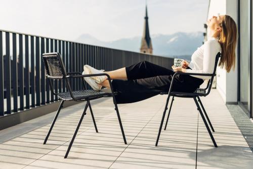 Balcony/terrace, harry's home Villach hotel & apartments in Villach Balcony/terrace, harry's home Villach hotel & apartments in Villach