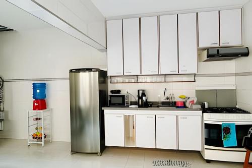 Kitchen, 0002 - Suite Conforto Exclusivo Bosque Maia in Maia Kitchen, 0002 - Suite Conforto Exclusivo Bosque Maia in Maia