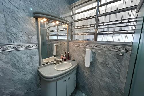 Bathroom, 0002 - Suite Conforto Exclusivo Bosque Maia in Maia Bathroom, 0002 - Suite Conforto Exclusivo Bosque Maia in Maia