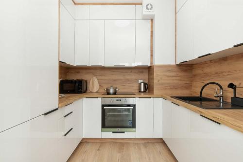 Cozinha, Kazimierza Wielkiego Cozy Apartment Parking by Rent like home in Borkowo Lostowickie Cozinha, Kazimierza Wielkiego Cozy Apartment Parking by Rent like home in Borkowo Lostowickie