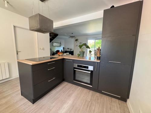 مطبخ, La Petite Citadine Proche Futuroscope in Saint-Eloi مطبخ, La Petite Citadine Proche Futuroscope in Saint-Eloi