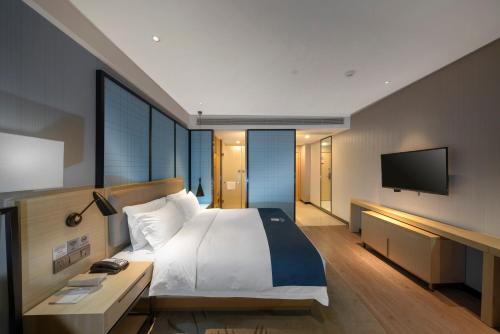 Echarm Hotel Haikou Zhongshan South Road High-speed Railway East Station in Qiongshan Echarm Hotel Haikou Zhongshan South Road High-speed Railway East Station in Qiongshan