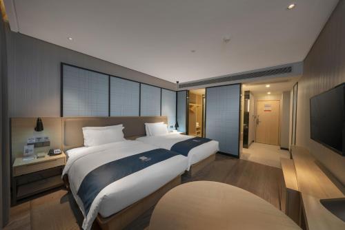 Echarm Hotel Haikou Zhongshan South Road High-speed Railway East Station in Qiongshan Echarm Hotel Haikou Zhongshan South Road High-speed Railway East Station in Qiongshan