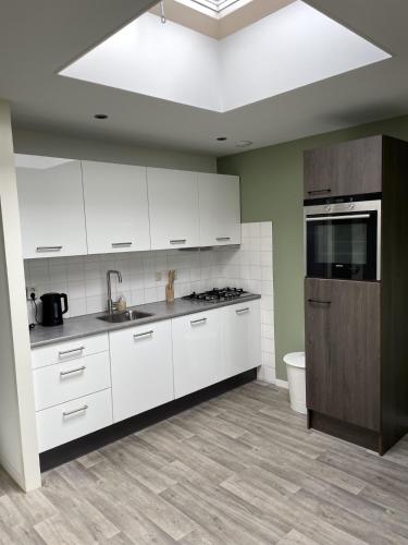 Kitchen, Burgervlotbrug aan zee met sauna in Burgerbrug Kitchen, Burgervlotbrug aan zee met sauna in Burgerbrug