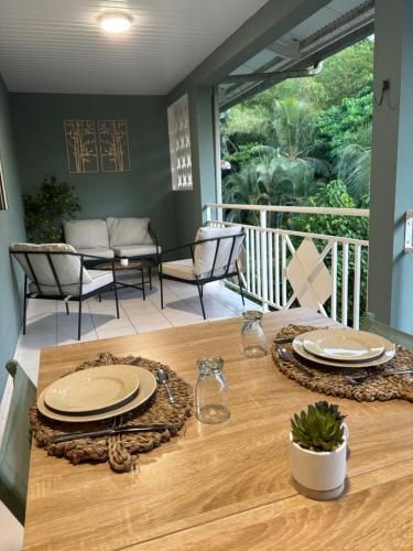 Balkon/terasa, La Canopé - T2 calme et central avec son jacuzzi (La Canope - T2 calme et central avec son jacuzzi) in Remire-Montjoly Balkon/terasa, La Canopé - T2 calme et central avec son jacuzzi (La Canope - T2 calme et central avec son jacuzzi) in Remire-Montjoly