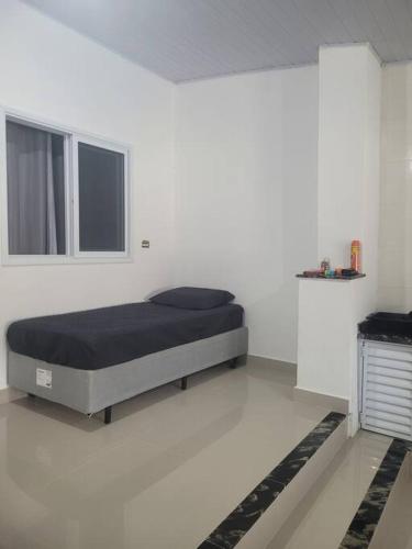 Casa com piscina Itanhaém (Casa com piscina Itanhaem) in โกรุมบา Casa com piscina Itanhaém (Casa com piscina Itanhaem) in โกรุมบา