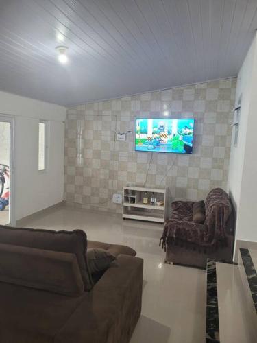 Casa com piscina Itanhaém (Casa com piscina Itanhaem) in โกรุมบา Casa com piscina Itanhaém (Casa com piscina Itanhaem) in โกรุมบา