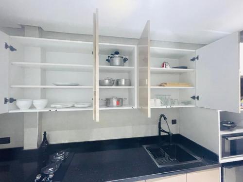 Kitchen, Appart Neuf, Propre et Cosy - Family Only in Golf Kitchen, Appart Neuf, Propre et Cosy - Family Only in Golf
