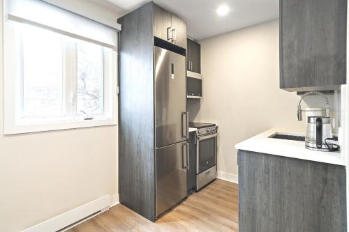 Kitchen, Glamorous 3BDR Heart of Plateau A in Plateau Mont Royal Kitchen, Glamorous 3BDR Heart of Plateau A in Plateau Mont Royal