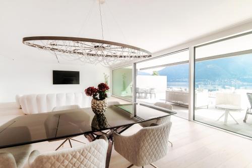 Skupni salon/TV območje, Luxury Minusio by Quokka 360 - Modern with terrace and amazing lake view in Minusio Skupni salon/TV območje, Luxury Minusio by Quokka 360 - Modern with terrace and amazing lake view in Minusio