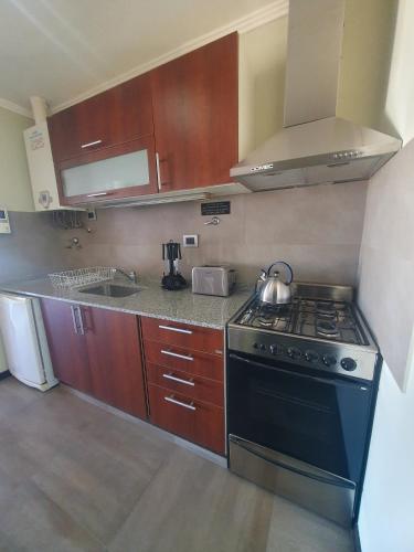 Kitchen, Departamento centrico y moderno en Comodoro - Mooi Apart in Comodoro Rivadavia Kitchen, Departamento centrico y moderno en Comodoro - Mooi Apart in Comodoro Rivadavia