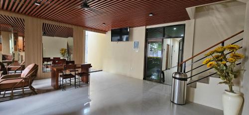 Shared lounge/TV area, Sunflower Hotel Syariah in Waru Shared lounge/TV area, Sunflower Hotel Syariah in Waru