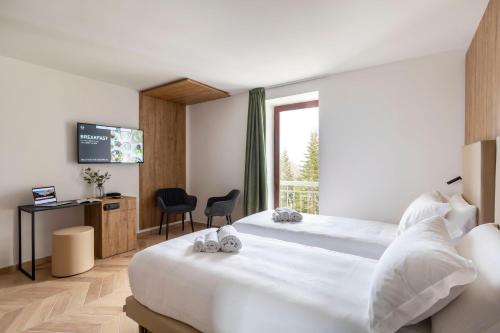 B&B โฮเทล ปาสโซ เทร โครชี คอร์ทินา (B&B Hotel Passo Tre Croci Cortina) in กอร์ตินา ดัมเปซโซ B&B โฮเทล ปาสโซ เทร โครชี คอร์ทินา (B&B Hotel Passo Tre Croci Cortina) in กอร์ตินา ดัมเปซโซ