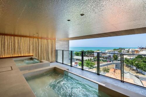 Bañera de hidromasaje, NWTs - Apartamentos con Vista Frontal al Mar en Maceió (NWTs - Apartamentos com Vista Frente-Mar em Maceio) in Maceio Bañera de hidromasaje, NWTs - Apartamentos con Vista Frontal al Mar en Maceió (NWTs - Apartamentos com Vista Frente-Mar em Maceio) in Maceio