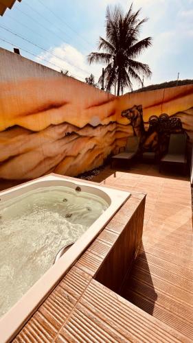 Hot tub, SUITES EM CANTOS Do MUNDO, ENCONTRE PAZ NESSA MICRO REGIAO ECOLOGICA, PROXIMO AS PRAIAS DO GUAIUBA E in Guaiuba Hot tub, SUITES EM CANTOS Do MUNDO, ENCONTRE PAZ NESSA MICRO REGIAO ECOLOGICA, PROXIMO AS PRAIAS DO GUAIUBA E in Guaiuba