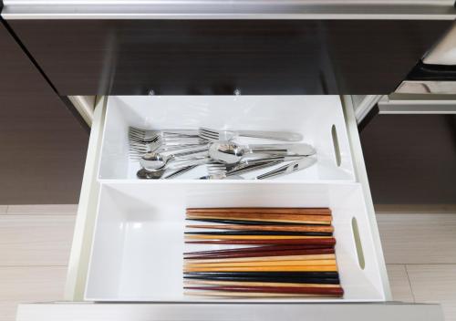 Kitchen, GLOCE 南伊豆アウトドアベースキャンプ(ゲストハウス) in Minamiizu Kitchen, GLOCE 南伊豆アウトドアベースキャンプ(ゲストハウス) in Minamiizu