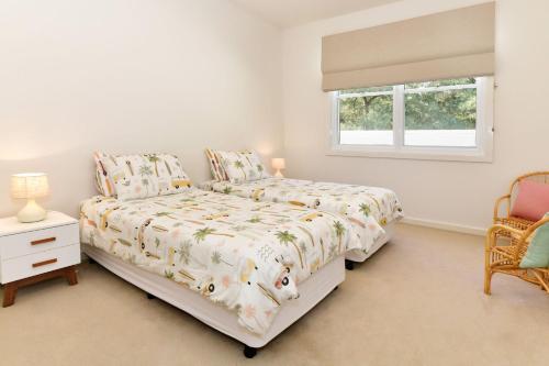 Echo Beach House in Уан Маил Бийч Echo Beach House in Уан Маил Бийч