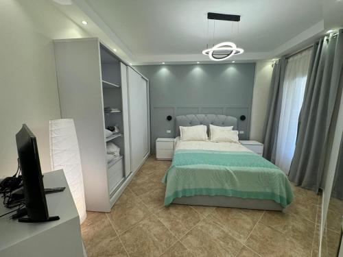 A one-bedroom apartment with a compact terrace