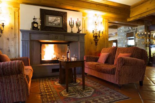Közös társalgó / TV, Gran Baita Hotel & Wellness in Courmayeur Városközpont Közös társalgó / TV, Gran Baita Hotel & Wellness in Courmayeur Városközpont