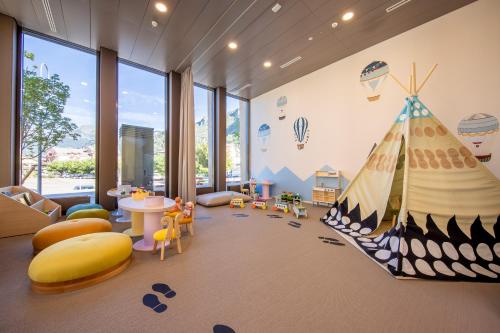 Parque infantil, SWISSPEAK Resorts Meiringen in Meiringen Parque infantil, SWISSPEAK Resorts Meiringen in Meiringen