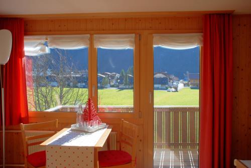 Balcony/terrace, Hotel Garni Hostatt in Engelberg Balcony/terrace, Hotel Garni Hostatt in Engelberg