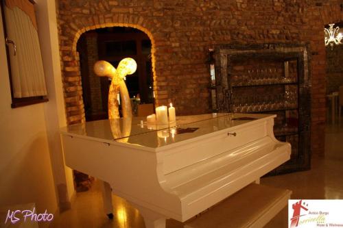 This photo about Hotel & Wellness Antico Borgo Torricella shared on HyHotel.com