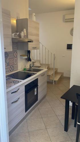 Kitchen, Book and Bed in Maglie Kitchen, Book and Bed in Maglie