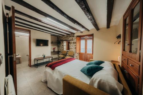 Közös társalgó / TV, Alojamiento rural Cal Sereno in Benassal Közös társalgó / TV, Alojamiento rural Cal Sereno in Benassal