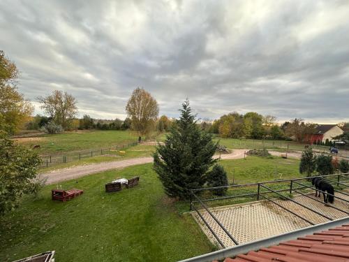 Vistas, Ruhiges Wohlfühlzimmer auf dem Pferdehof Gut Greppin - mit Kochnische, WLAN & kostenlosem Parken (Ruhiges Wohlfuhlzimmer auf dem Pferdehof Gut Greppin - mit Kochnische, WLAN & kostenlosem Parken) in Bitterfeld-Wolfen Vistas, Ruhiges Wohlfühlzimmer auf dem Pferdehof Gut Greppin - mit Kochnische, WLAN & kostenlosem Parken (Ruhiges Wohlfuhlzimmer auf dem Pferdehof Gut Greppin - mit Kochnische, WLAN & kostenlosem Parken) in Bitterfeld-Wolfen