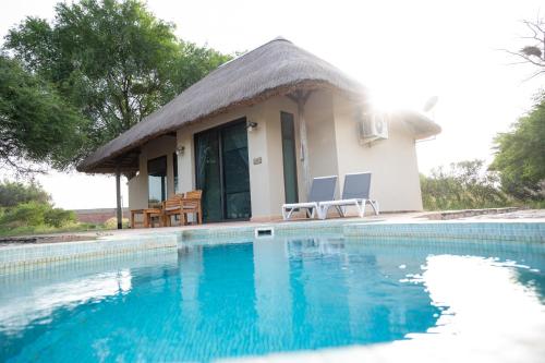 חדר שינה, Lodge du Ranch de Bandia in סינטיאן חדר שינה, Lodge du Ranch de Bandia in סינטיאן