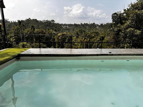 مسبح, Wayanad Vista Service Apartment in Paralikunnu مسبح, Wayanad Vista Service Apartment in Paralikunnu