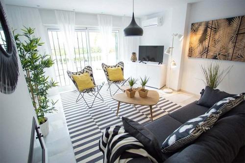 Közös társalgó / TV, Apartamento lujoso LOS COCOTEROS in Mijas Costa Közös társalgó / TV, Apartamento lujoso LOS COCOTEROS in Mijas Costa