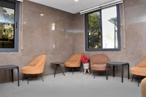 Спільний лаунж/ТБ зона, Hôtel du Plateau in Дакар Спільний лаунж/ТБ зона, Hôtel du Plateau in Дакар