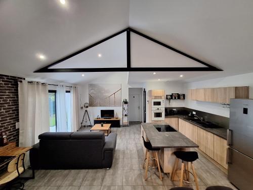 Közös társalgó / TV, L'atelier du Guette-Loup in Thouare Sur Loire Közös társalgó / TV, L'atelier du Guette-Loup in Thouare Sur Loire